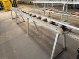 a long table that has a bunch of wheels on it