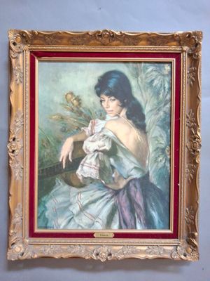 tableau représentant une femme en robe blanche tenant une fleur