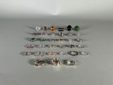 a lot of rings that are sitting on a table