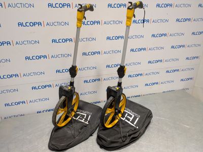 two scooters that are sitting on the floor