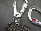 a bottle opener and a wrench on a table