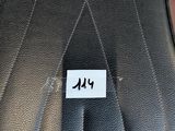 a close up of a guitar case with a name tag on it
