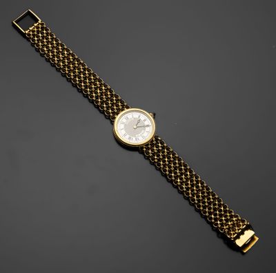 une montre-bracelet en or 18 carats