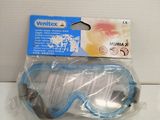 a pair of goggles sitting on top of a box