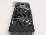 a close up of a video card with a cooling fan