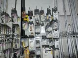 a lot of electronic devices on the shelves in the store