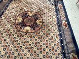 a large rug on the floor in a room