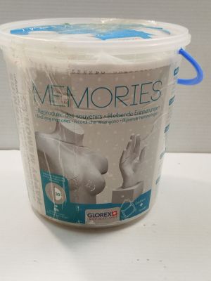 a plastic container with a blue handle sitting on a table