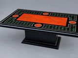 a black table with orange and green inlays on it