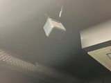 a picture of a ceiling with a light hanging from the ceiling