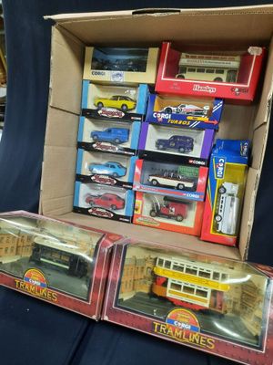 a box of toy cars and a box of other toy cars