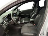 the interior of a car with a steering wheel and a dashboard