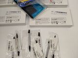 a lot of pens and a pen on the table