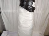 a large piece of plastic wrapped around a large vase