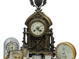 de nombreux types d'horloges présentés sur un fond blanc