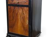 an image of a wooden cabinet with a drawer on top of it