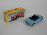 toy car and box on white surface with white background