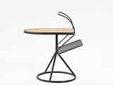 a black table with a wooden top and metal legs