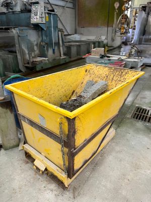 a yellow container that has some sort of stuff inside of it