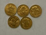 five gold sovereigns, one of which is a sovereign and the other of which is a sovereign