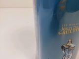a blue vase that has a picture of a man on it