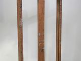 a pair of skis that are standing up against a wall