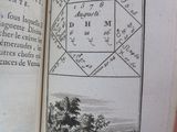 an open book with a picture of a boat in the water