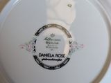 a white plate with a picture of a woman on it
