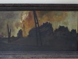 a picture of a painting of a city on the wall