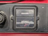 a close up of a car dashboard with a clock on it