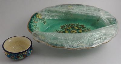 a bowl and a cup sitting on a table