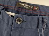 a close up of a pair of jeans with a tag on it