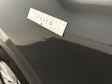 a close up of a sticker on the side of a car