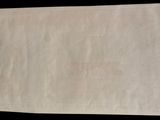 a piece of paper that is on a black surface