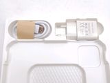 a white tray with a charger and a charger attached to it