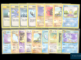 several pokemon cards are arranged in a row on a black background