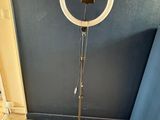 an image of a ring light on a tripod stand