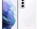 a white samsung galaxy s20 is next to a white samsung galaxy s20