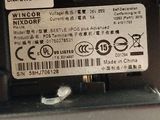 a close up of a label on the back of a cell phone