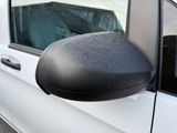 a car that has a mirror on the side of it