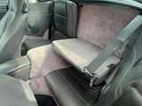 a picture of the inside of a car with a seat belt