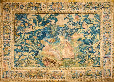 an image of a tapestry hanging on a wall in a room