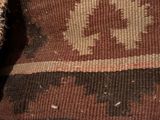 a bag with a pattern on it sitting on a table