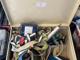 a box full of tools sitting on the floor