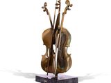 sculpture of a violin and a cello on a marble base