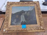 a picture of a picture of a waterfall in a gold frame
