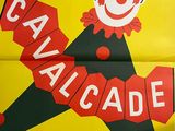 a yellow poster with a clown holding a sign that says cavalcade
