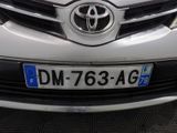 a close up of the front of a car with a license plate on it