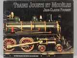 un livre sur lequel figure l'image d'un train