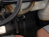 a close up of a steering wheel and dashboard of a car